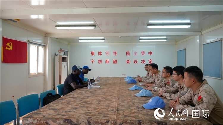 圖1 檢查組聽取工作匯報(bào)。王軍杰攝